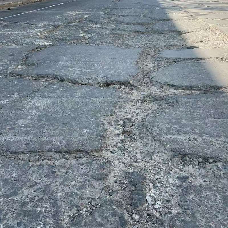 新乐路面起砂露石子修补料